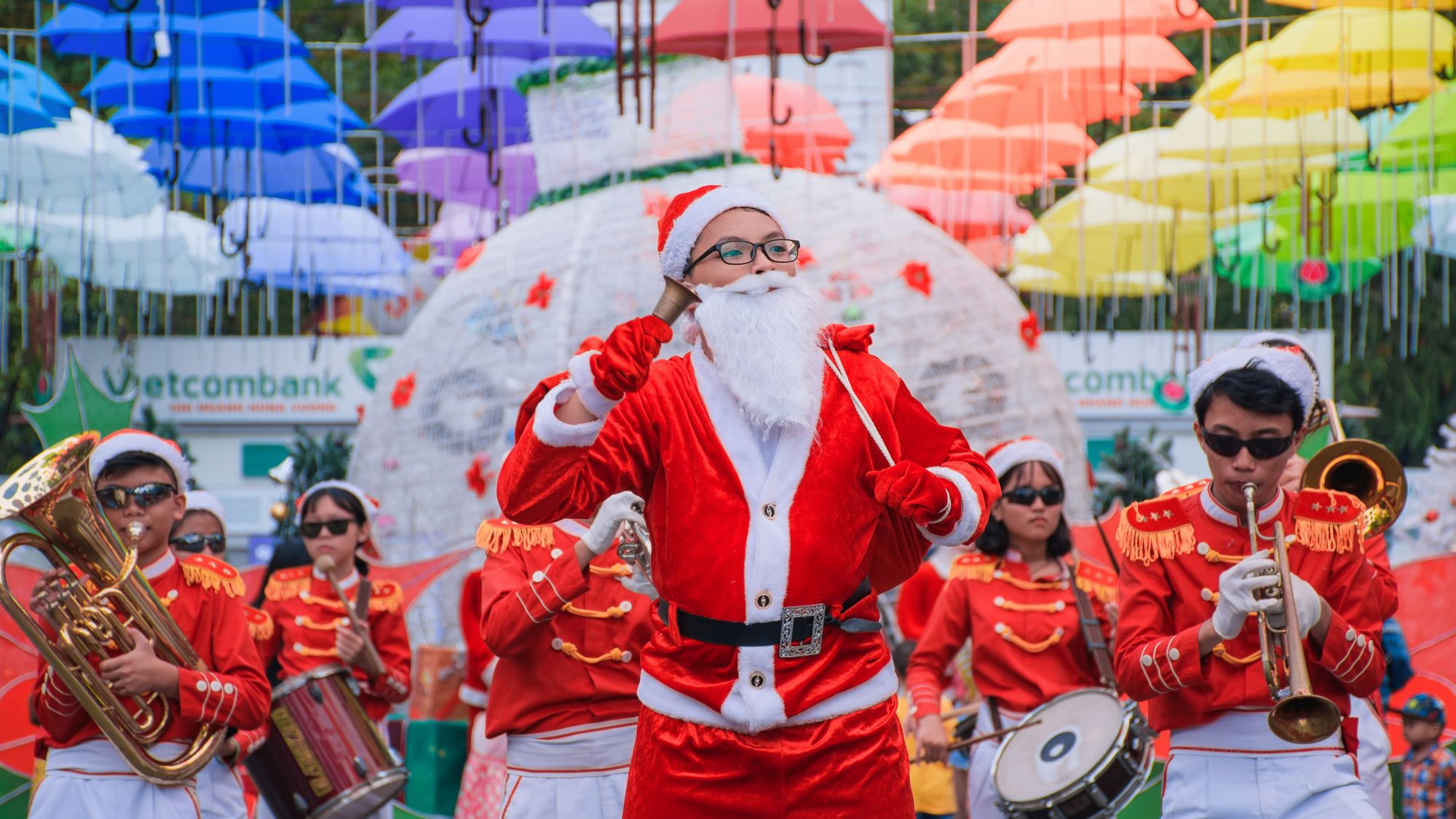 Dress Up In Santa Outfits And Walk Around The Streets During Christmas in Vietnam