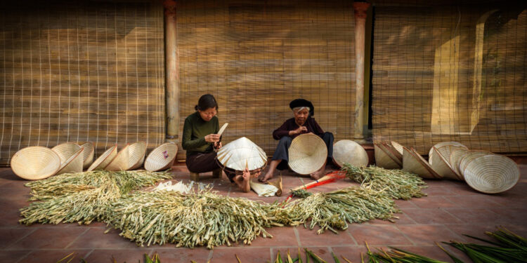 Chuong Conical Hat Making Village (Hanoi) is a traditional craft village you should visit once