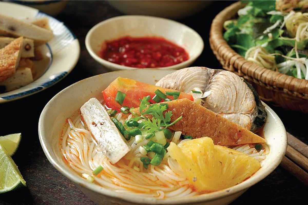Bun Cha Ca is a traditional Vietnamese noodle soup topped with fish cakes