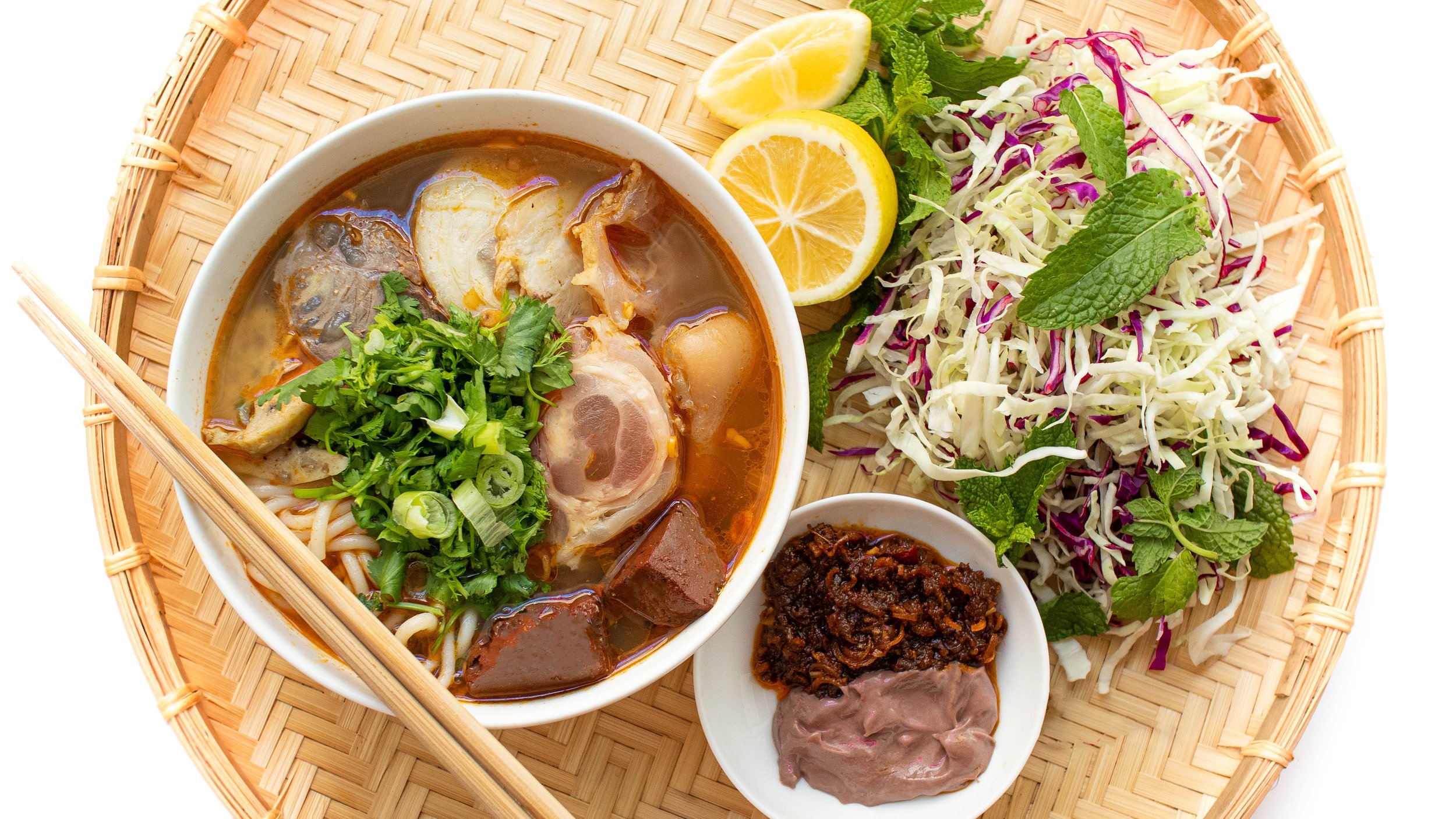Taste a spicy and aromatic Vietnamese noodle soup called Bun Bo Hue.